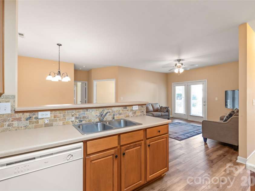 16439 Golden River Lane, Charlotte, NC 28277.  MLS# CAR4360142, YatesRealty ID 17856. Kitchen-Dining-Living