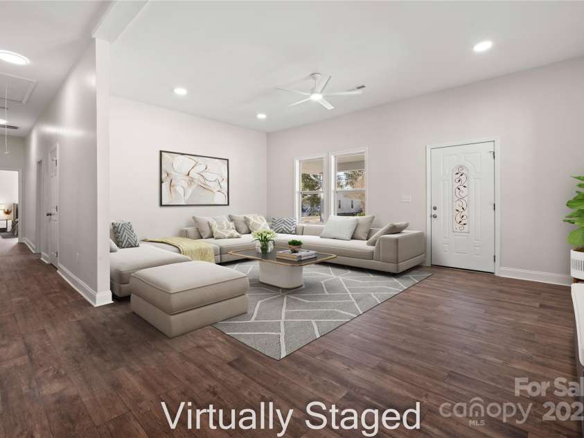 167 Saluda Street, Chester, SC 29706.  MLS# CAR4232529, YatesRealty ID 17857. Virtually Staged Living room - open concept