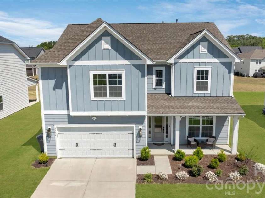 3934 Zinnia Drive, Harrisburg, NC 28075.  MLS# CAR4367243, YatesRealty ID 17857. Grass has been digitally enhanced