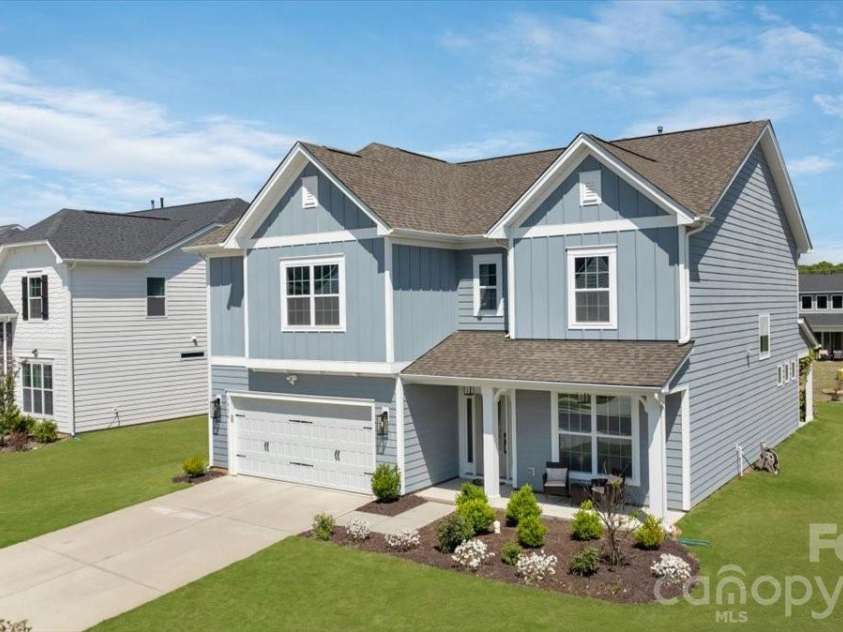 3934 Zinnia Drive, Harrisburg, NC 28075.  MLS# CAR4367243, YatesRealty ID 17857. Grass has been digitally enhanced