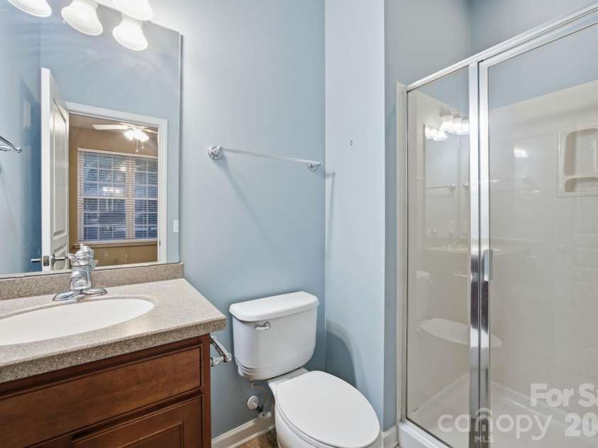 645 Sixth Baxter Crossing, Fort Mill, SC 29708.  MLS# CAR4373614, YatesRealty ID 17860. En suite bathroom with walk in shower