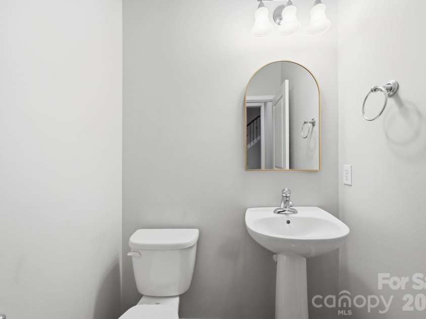 645 Sixth Baxter Crossing, Fort Mill, SC 29708.  MLS# CAR4373614, YatesRealty ID 17860. Guest bath on main level