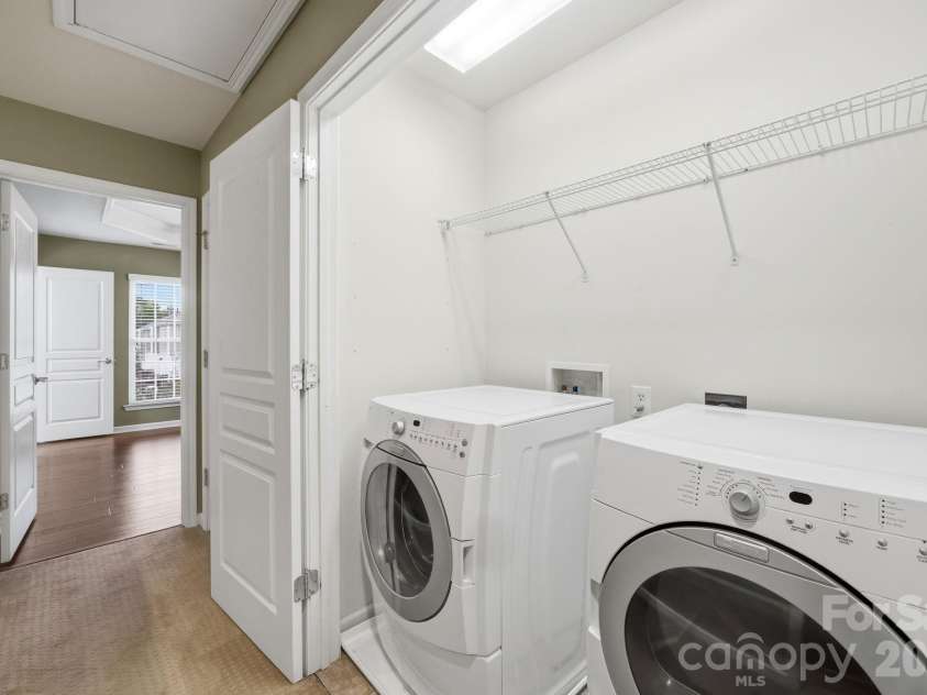 645 Sixth Baxter Crossing, Fort Mill, SC 29708.  MLS# CAR4373614, YatesRealty ID 17860. Laundry area on secondary level