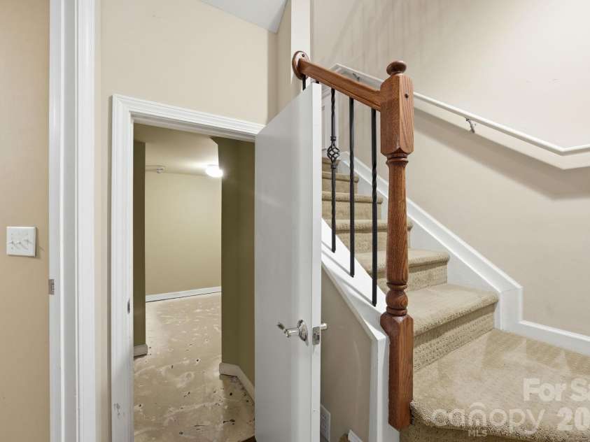 645 Sixth Baxter Crossing, Fort Mill, SC 29708.  MLS# CAR4373614, YatesRealty ID 17860. Stairs to lower level