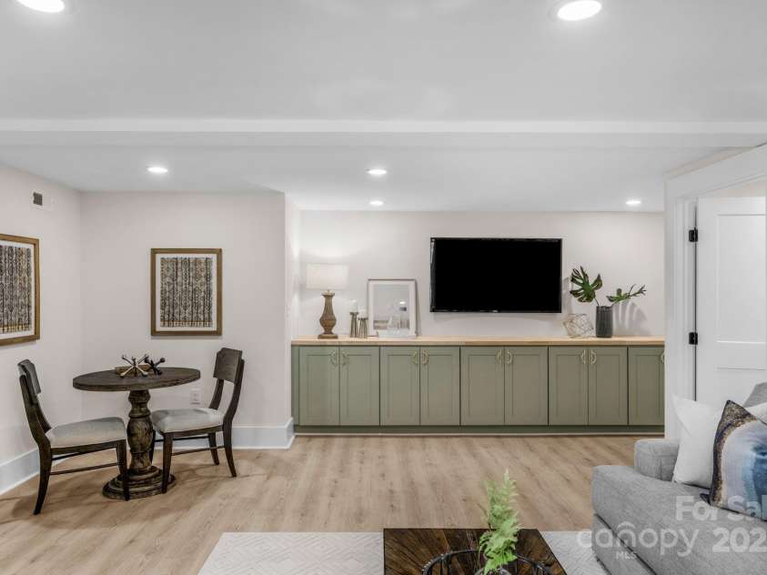 215 Wyanoke Avenue, Charlotte, NC 28205.  MLS# CAR4317224, YatesRealty ID 17863. Built in Cabinets and Additional Sitting Area