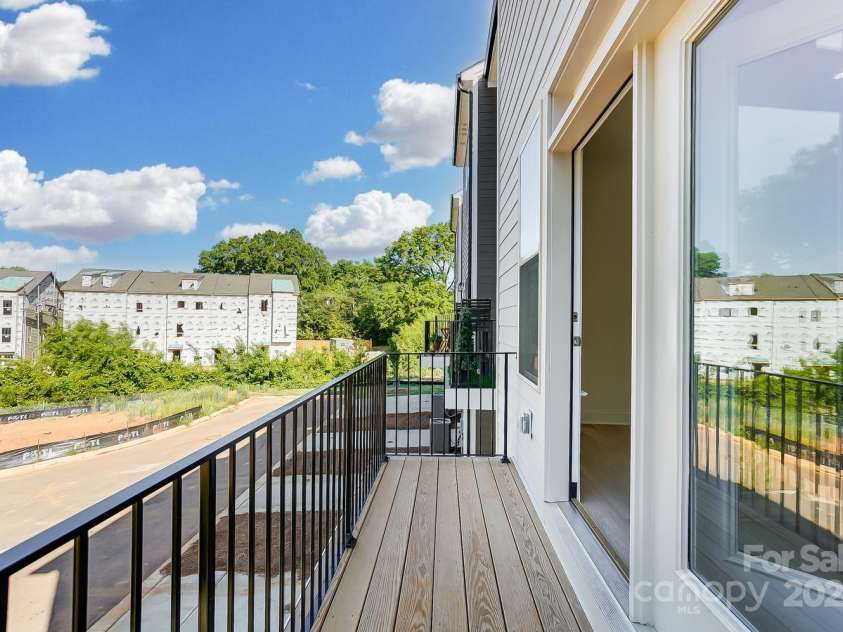 2907 Trade Street, Charlotte, NC 28208.  MLS# CAR4254572, YatesRealty ID 17868. Balcony off Main Level