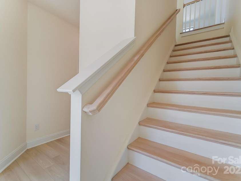 2907 Trade Street, Charlotte, NC 28208.  MLS# CAR4254572, YatesRealty ID 17868. Lower to Main Staircase