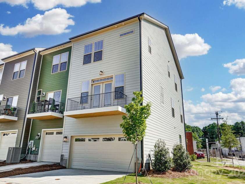 2907 Trade Street, Charlotte, NC 28208.  MLS# CAR4254572, YatesRealty ID 17868. Rear of Townhome