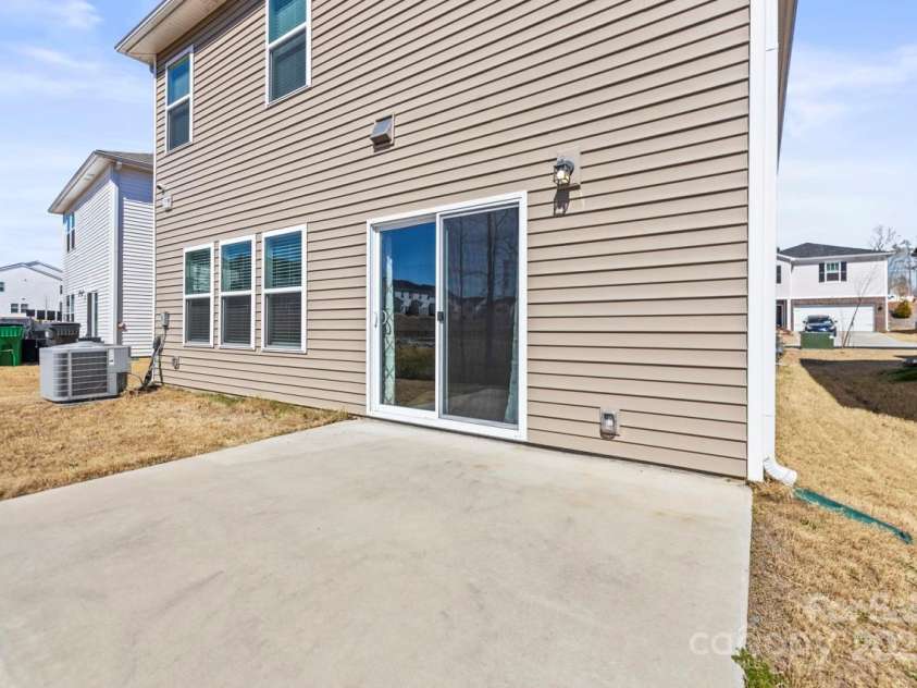 2131 Belterra Drive, Charlotte, NC 28216.  MLS# CAR4228809, YatesRealty ID 1787. Back patio