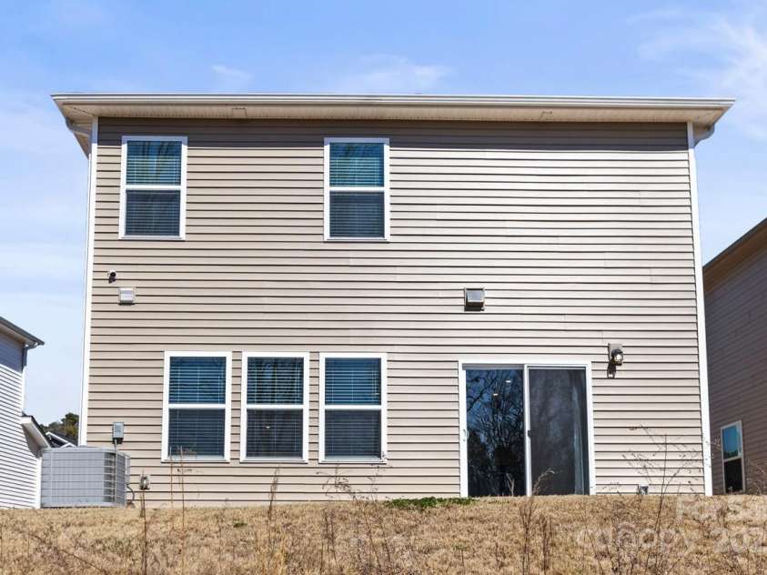 2131 Belterra Drive, Charlotte, NC 28216.  MLS# CAR4228809, YatesRealty ID 1787. Back view of house