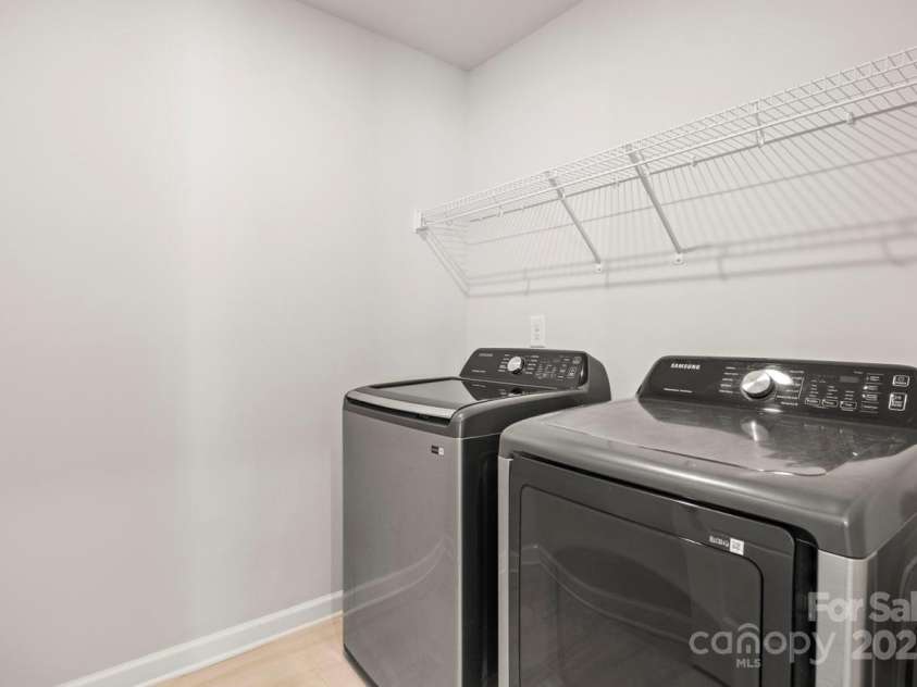 2131 Belterra Drive, Charlotte, NC 28216.  MLS# CAR4228809, YatesRealty ID 1787. Laundry Room complete with washer and dryer!