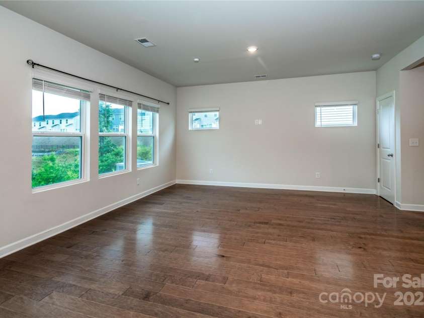 2131 Belterra Drive, Charlotte, NC 28216.  MLS# CAR4228809, YatesRealty ID 1787. Lots of light in the family room