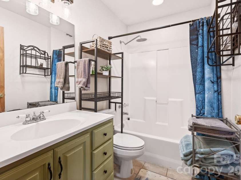 8 Blue Sky Drive, Leicester, NC 28748.  MLS# CAR4359937, YatesRealty ID 17871. Ceramic tile in bathrooms