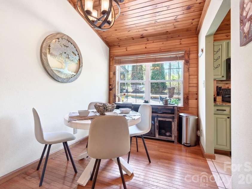 8 Blue Sky Drive, Leicester, NC 28748.  MLS# CAR4359937, YatesRealty ID 17871. Cozy Dining Area Off Kitchen