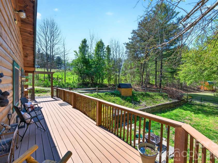 8 Blue Sky Drive, Leicester, NC 28748.  MLS# CAR4359937, YatesRealty ID 17871. Deck Facing Fenced-in Yard