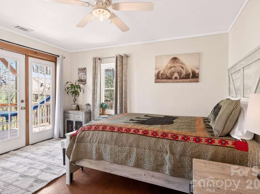 8 Blue Sky Drive, Leicester, NC 28748.  MLS# CAR4359937, YatesRealty ID 17871. Lower Level Bedroom