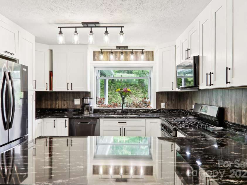 68 Broyles Road, Hendersonville, NC 28791.  MLS# CAR4263952, YatesRealty ID 17872. 