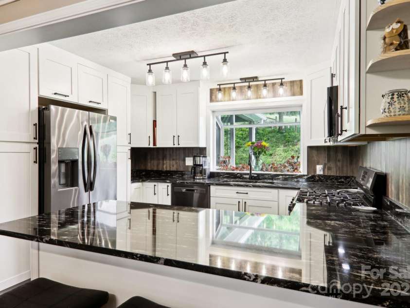 68 Broyles Road, Hendersonville, NC 28791.  MLS# CAR4263952, YatesRealty ID 17872. 