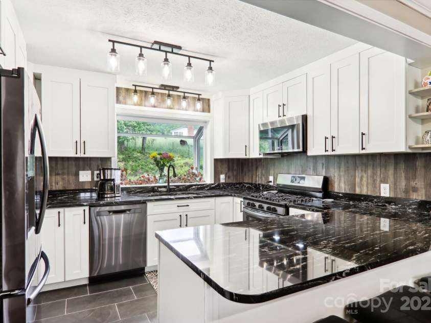68 Broyles Road, Hendersonville, NC 28791.  MLS# CAR4263952, YatesRealty ID 17872. Beautifully Updated Kitchen