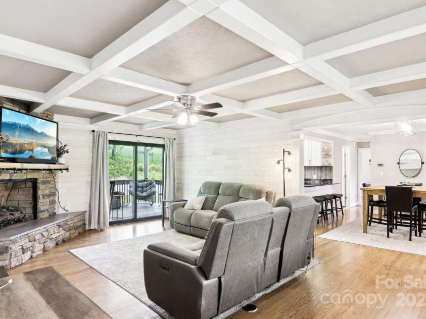 68 Broyles Road, Hendersonville, NC 28791.  MLS# CAR4263952, YatesRealty ID 17872. Coffered Cielings and a Stone Fireplace