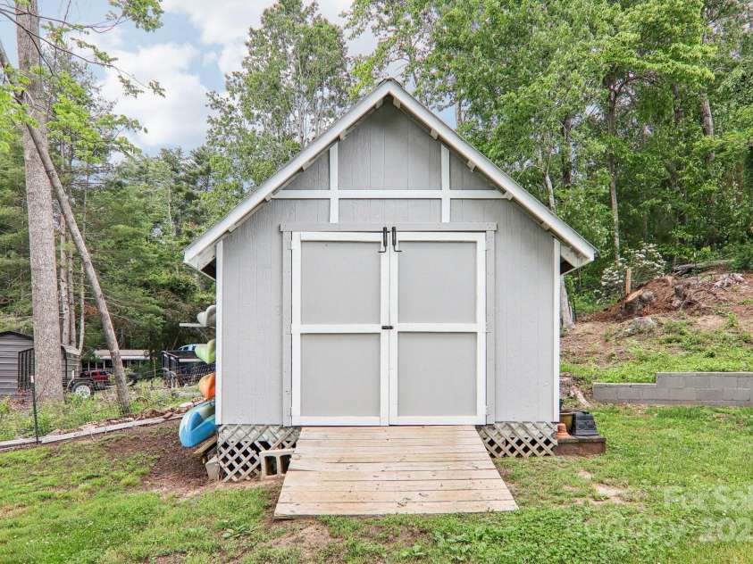 68 Broyles Road, Hendersonville, NC 28791.  MLS# CAR4263952, YatesRealty ID 17872. Storage Shed
