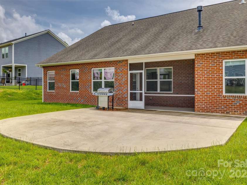 4926 Trayton Avenue, Gastonia, NC 28056.  MLS# CAR4250223, YatesRealty ID 17879. Large Concrete Patio