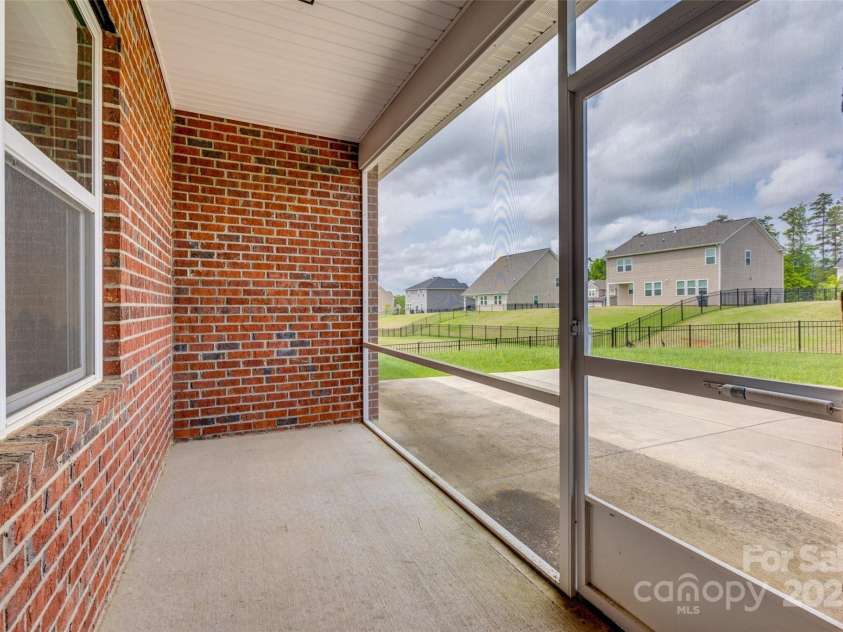 4926 Trayton Avenue, Gastonia, NC 28056.  MLS# CAR4250223, YatesRealty ID 17879. Screen Rear Porch