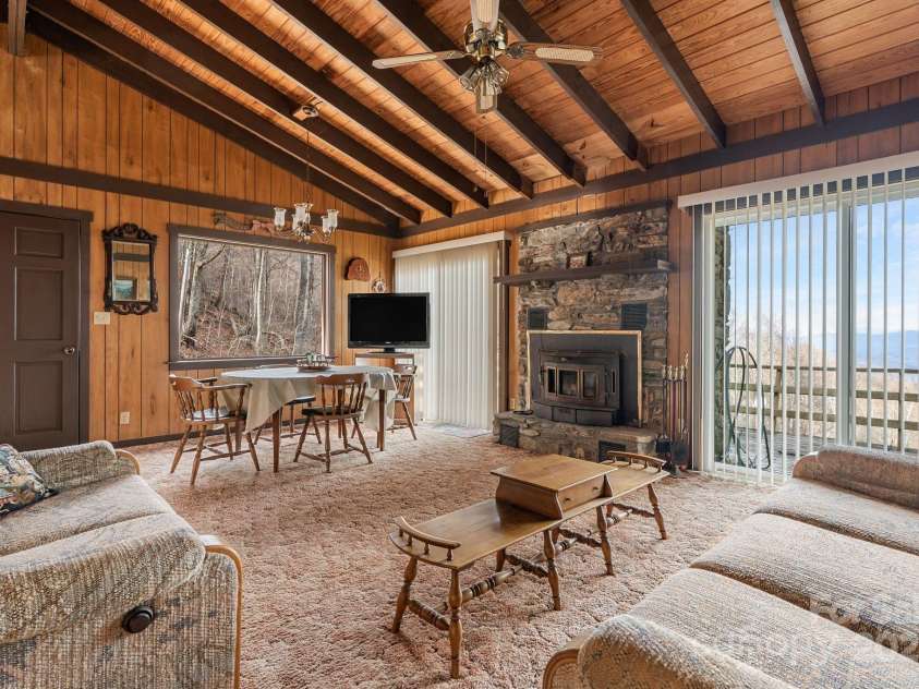 2650 Secluded Valley Road, Marshall, NC 28753.  MLS# CAR4324668, YatesRealty ID 1788. Light filled living/dining area