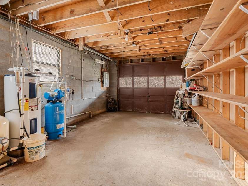 2650 Secluded Valley Road, Marshall, NC 28753.  MLS# CAR4324668, YatesRealty ID 1788. Lower level garage