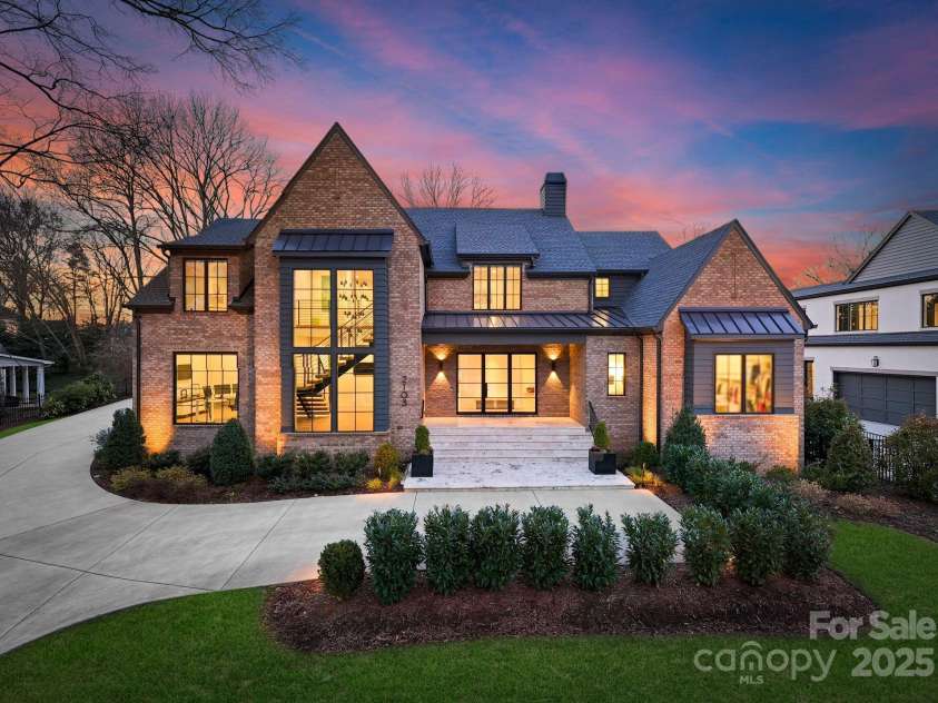 2103 Cortelyou Road, Charlotte, NC 28211.  MLS# CAR4214661, YatesRealty ID 17880. Front Aerial Twilight