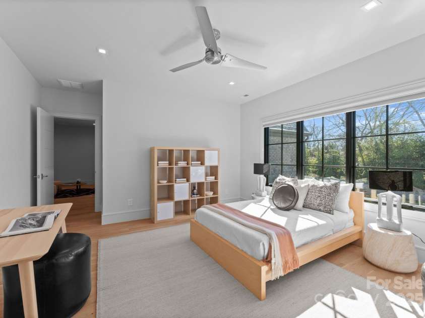 2103 Cortelyou Road, Charlotte, NC 28211.  MLS# CAR4214661, YatesRealty ID 17880. Upper Level Guest Bedroom with En_Suite Bathroom, Walk-In Closet and Large Walk-In Attic Storage