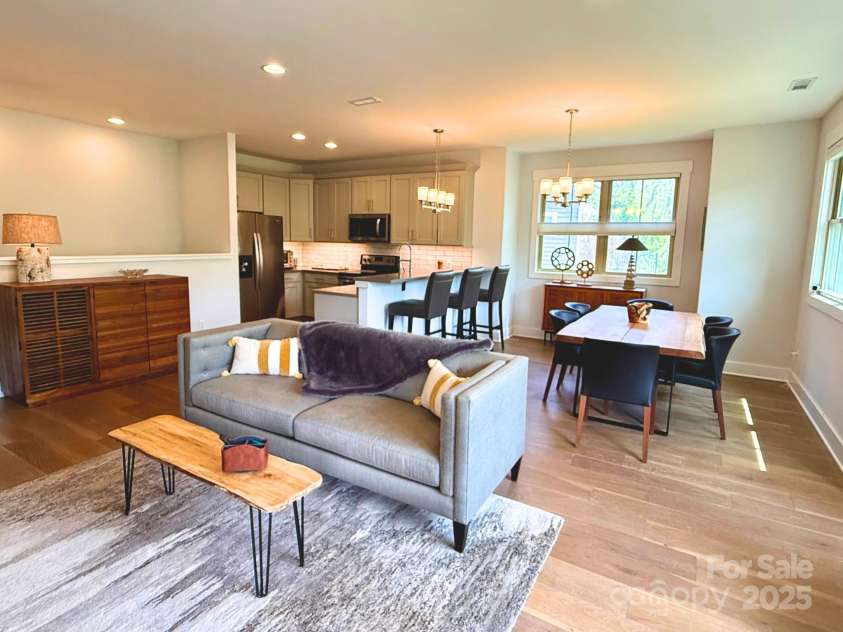 22 Thornes Lane, Asheville, NC 28805.  MLS# CAR4222972, YatesRealty ID 17882. Alternative furniture placement. Couch in front of TV