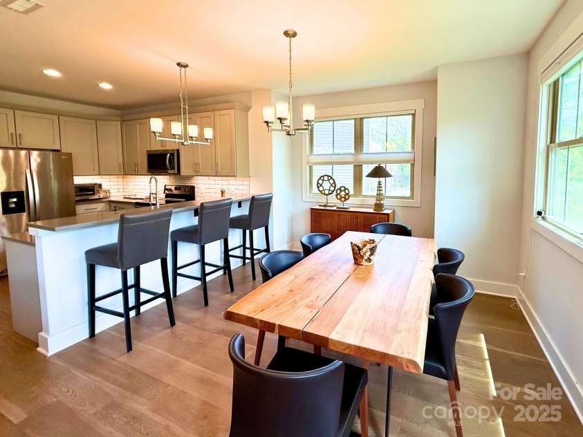 22 Thornes Lane, Asheville, NC 28805.  MLS# CAR4222972, YatesRealty ID 17882. Table near kitchen