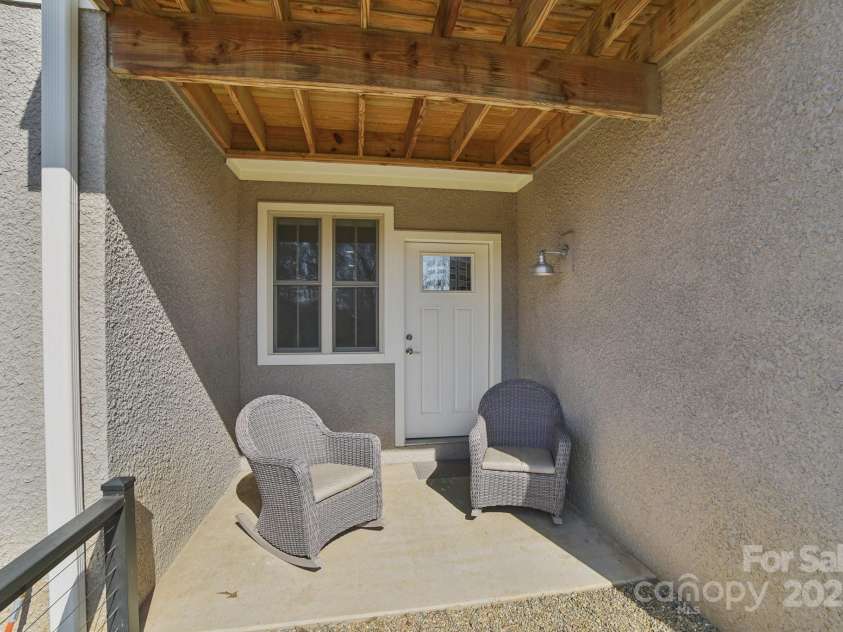 22 Thornes Lane, Asheville, NC 28805.  MLS# CAR4222972, YatesRealty ID 17882. Walk out covered patio