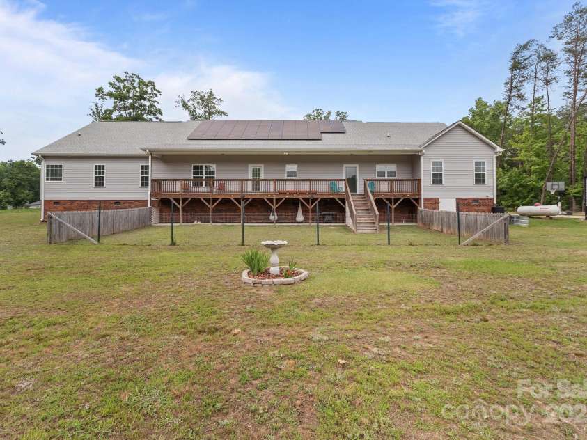 1230 Long Creek Lane, Salisbury, NC 28146.  MLS# CAR4258339, YatesRealty ID 17887. 34 solar panels generate enough energy to subsidize a large portion of the electricity.