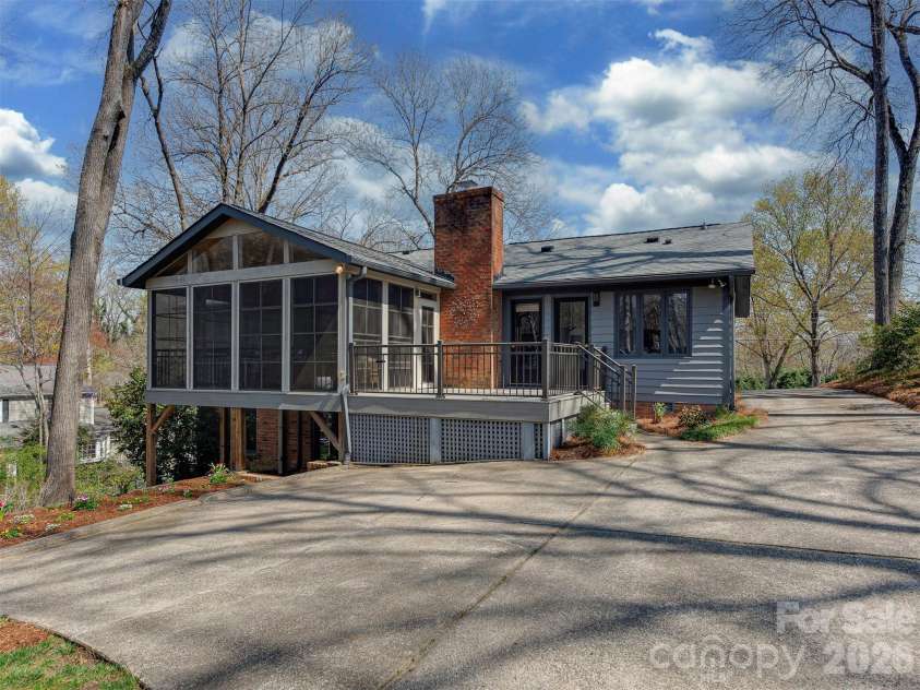 7244 Terrace Drive, Charlotte, NC 28211.  MLS# CAR4357695, YatesRealty ID 17887. Between the four-season porch, back deck, and covered patio, you’ll find endless ways to enjoy the beauty and tranquility of the outdoors, all set on one of the most tucked-away and peaceful streets in the Stonehaven co