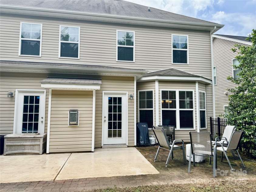 3678 Privette Road, Matthews, NC 28104.  MLS# CAR4258856, YatesRealty ID 17890. Extended rear patio