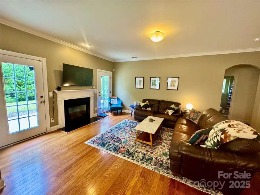 3678 Privette Road, Matthews, NC 28104.  MLS# CAR4258856, YatesRealty ID 17890. Family room w/gas FP