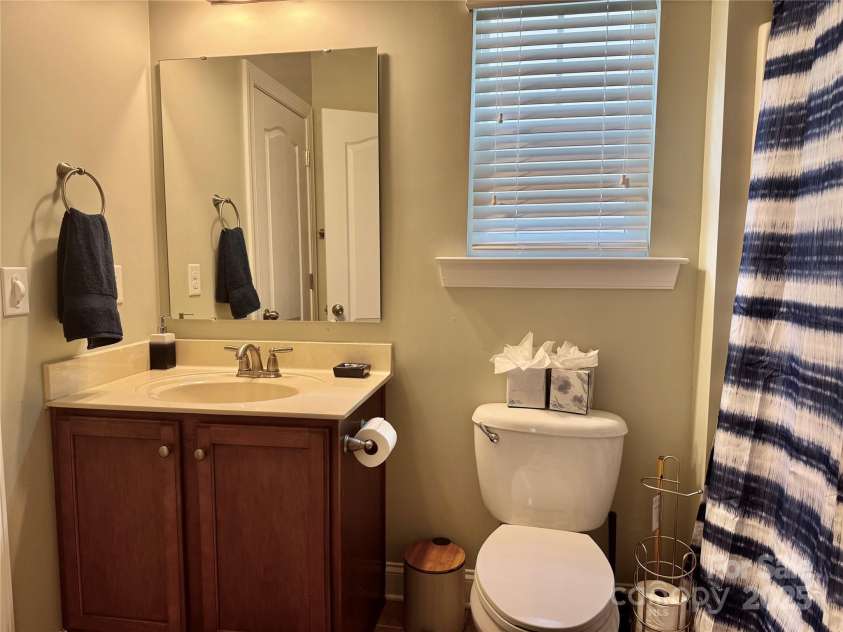 3678 Privette Road, Matthews, NC 28104.  MLS# CAR4258856, YatesRealty ID 17890. Main level full bath