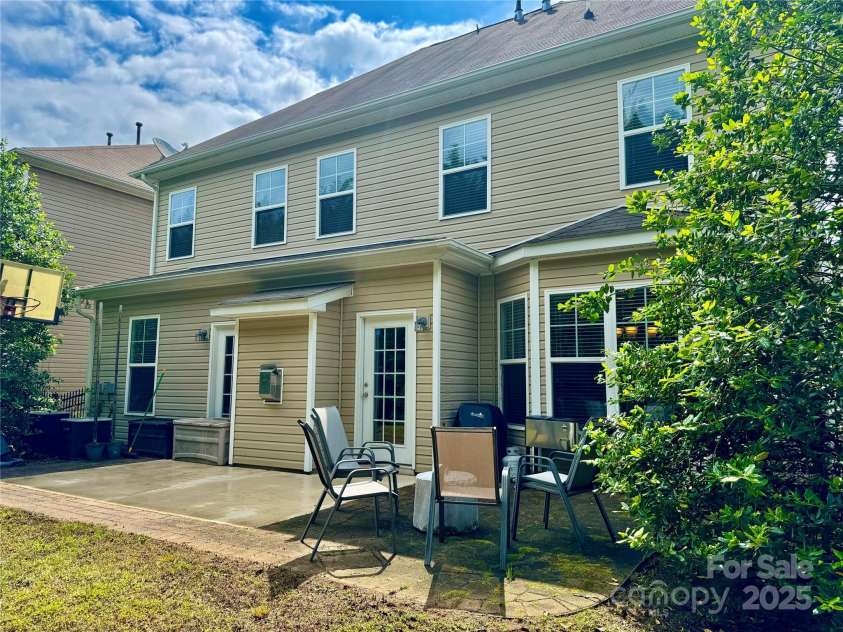 3678 Privette Road, Matthews, NC 28104.  MLS# CAR4258856, YatesRealty ID 17890. Rear view of patio
