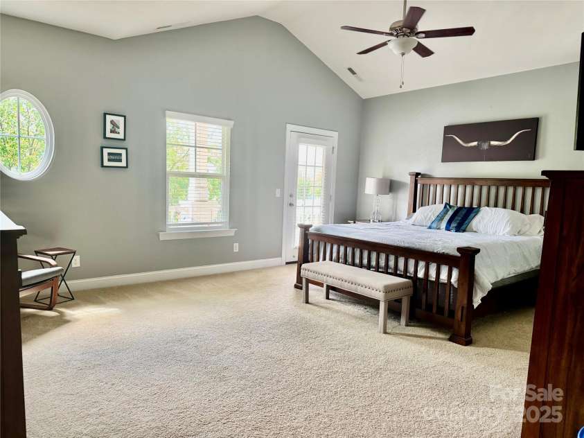 3678 Privette Road, Matthews, NC 28104.  MLS# CAR4258856, YatesRealty ID 17890. Spacious primary suite w/vaulted ceiling