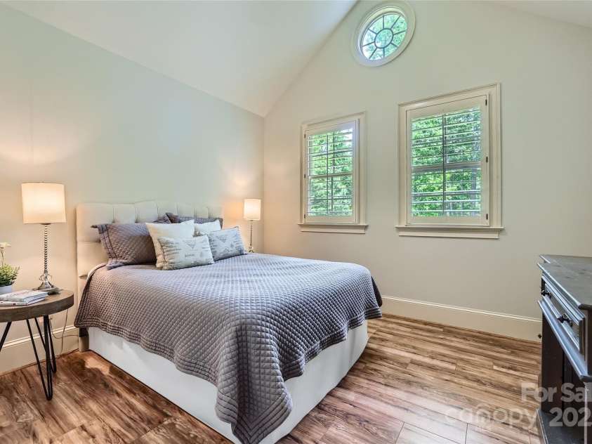 1056 James Madison Drive, Matthews, NC 28104.  MLS# CAR4260538, YatesRealty ID 17891. 2nd upstairs bedroom with vaulted ceiling