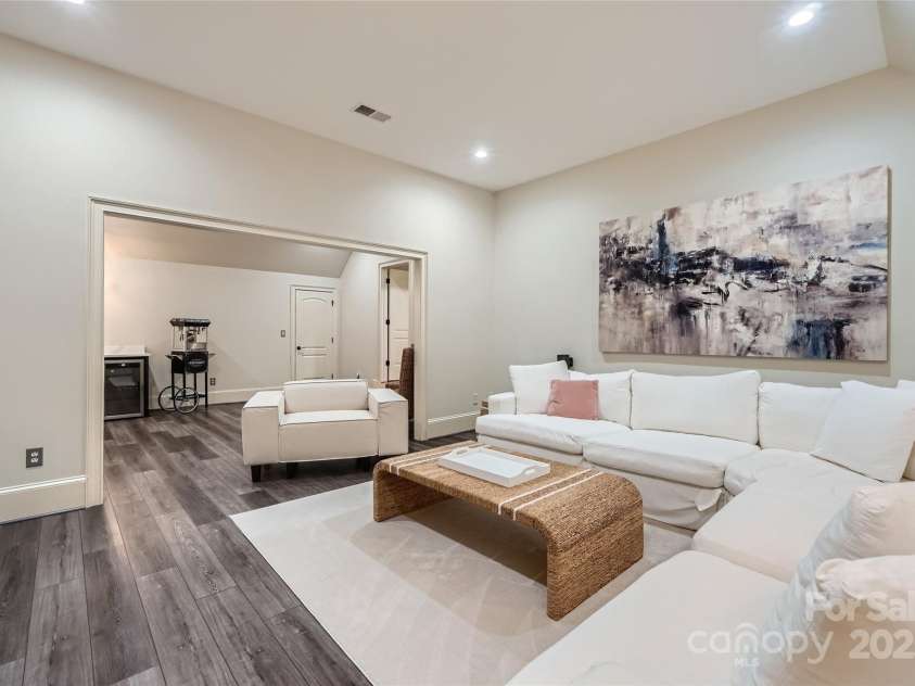 1056 James Madison Drive, Matthews, NC 28104.  MLS# CAR4260538, YatesRealty ID 17891. Bonus room movie room area