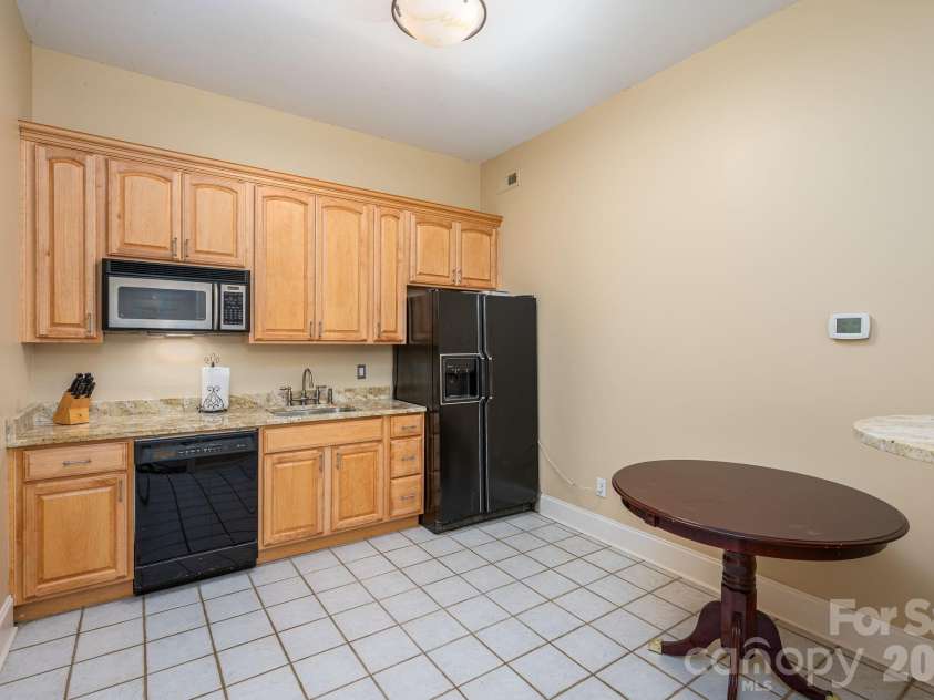 103 Shelter Cove Lane, Mooresville, NC 28117.  MLS# CAR4347364, YatesRealty ID 17892. Kitchenette on lower level