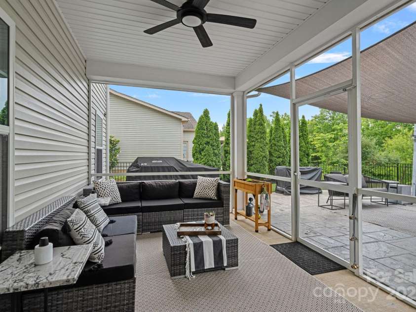 7331 Millstone Circle, Concord, NC 28025.  MLS# CAR4261579, YatesRealty ID 17892. Covered Screened Porch