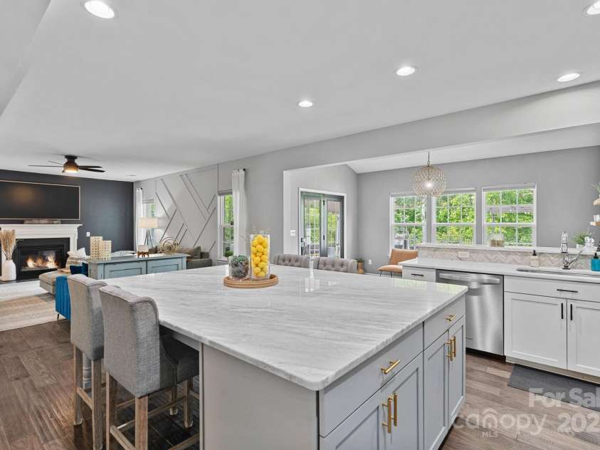 7331 Millstone Circle, Concord, NC 28025.  MLS# CAR4261579, YatesRealty ID 17892. Kitchen, Living Room, & Morning Room