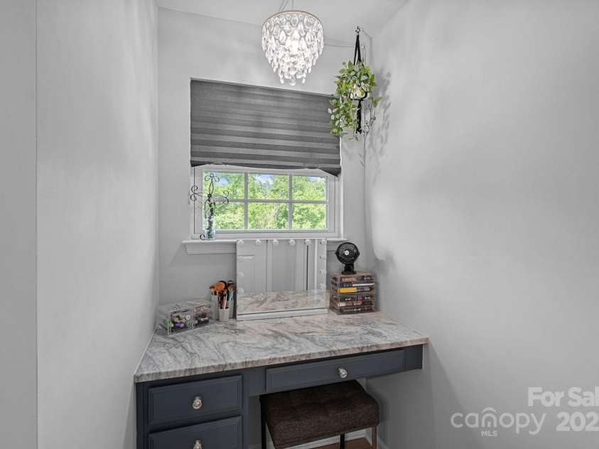 7331 Millstone Circle, Concord, NC 28025.  MLS# CAR4261579, YatesRealty ID 17892. Make-Up Vanity With Mont Blanc Marble Countertop