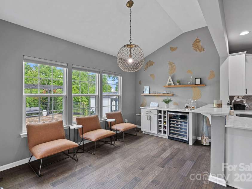 7331 Millstone Circle, Concord, NC 28025.  MLS# CAR4261579, YatesRealty ID 17892. Morning Room - Custom Built - In Bar With Mont Blanc Marble Countertop