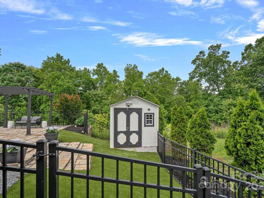 7331 Millstone Circle, Concord, NC 28025.  MLS# CAR4261579, YatesRealty ID 17892. Shed With Electric