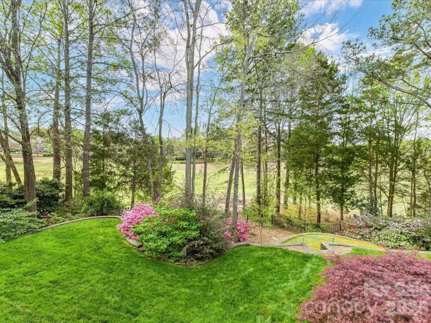 15615 McCullers Court, Charlotte, NC 28277.  MLS# CAR4367013, YatesRealty ID 17898. Backyard overlooking the golf course